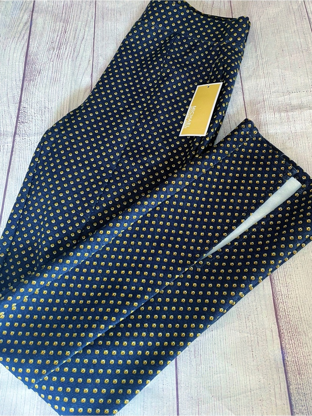 Michael Kors navy blue and gold geometric print pants with split hemline